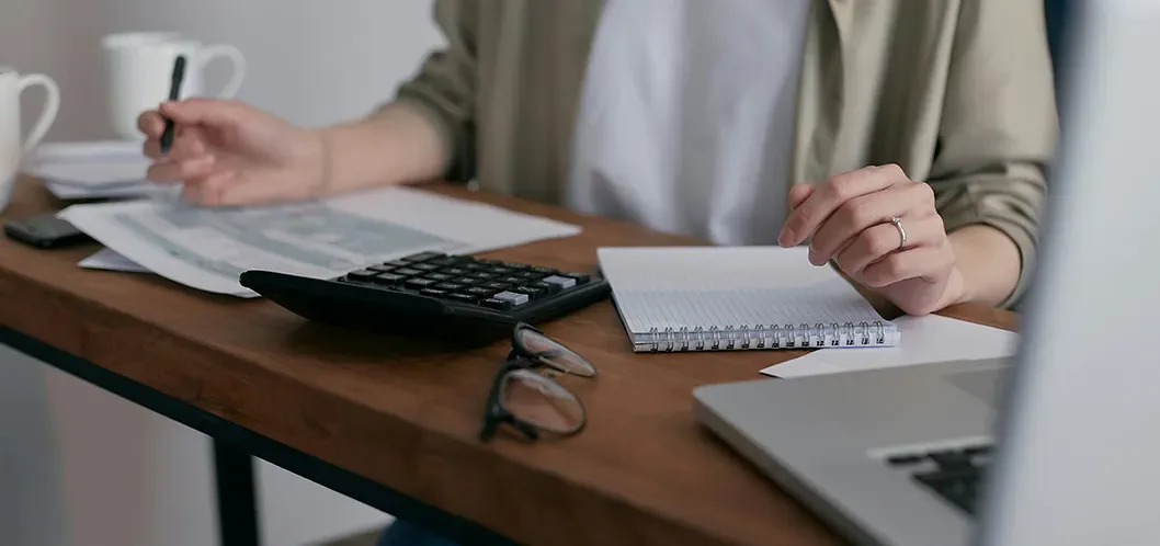 Going through the numbers at a desk