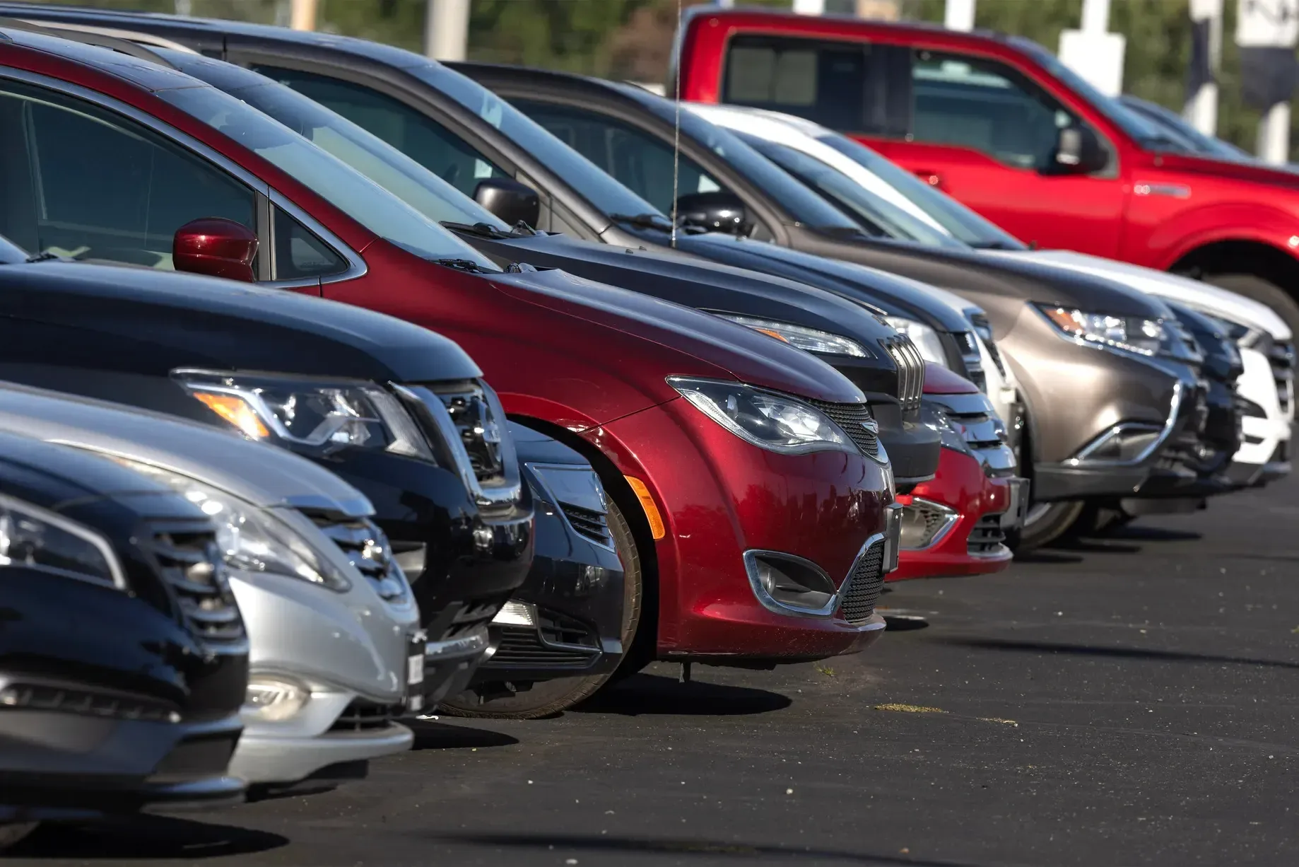 A row of cars on the lot
